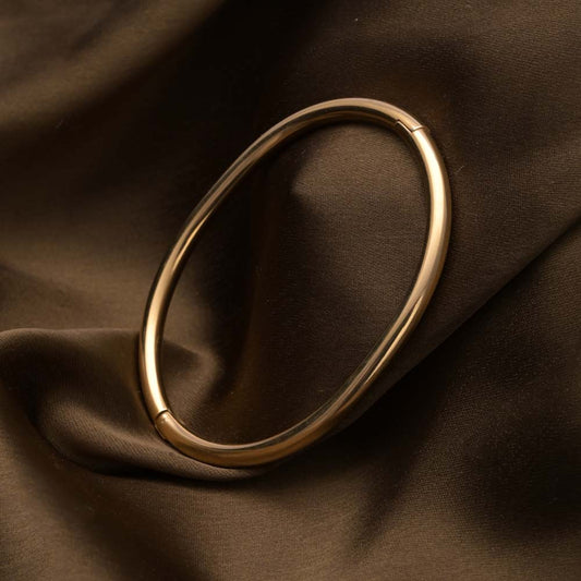 Gilded Oval Bangle Bracelet